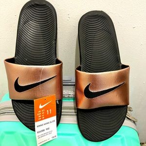 Brand new Nike gold slides. Original tags, never worn